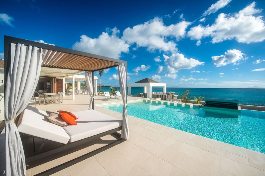 View from the sun lounger by the pool at Baie Longue across the sea at St Martin