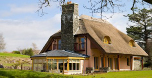 The porch overlooking the Lakes of Killarney at the Killarney Lakeside Mansion.  Irish Vacations at their best.