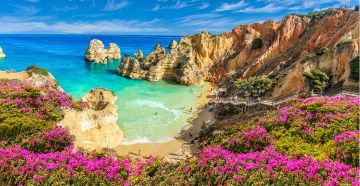 Beach and cliffs of Algarve, Portugal. A stunning metal print capturing the beauty of this coastal region.