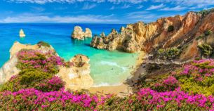 Beach and cliffs of Algarve, Portugal. A stunning metal print capturing the beauty of this coastal region.
